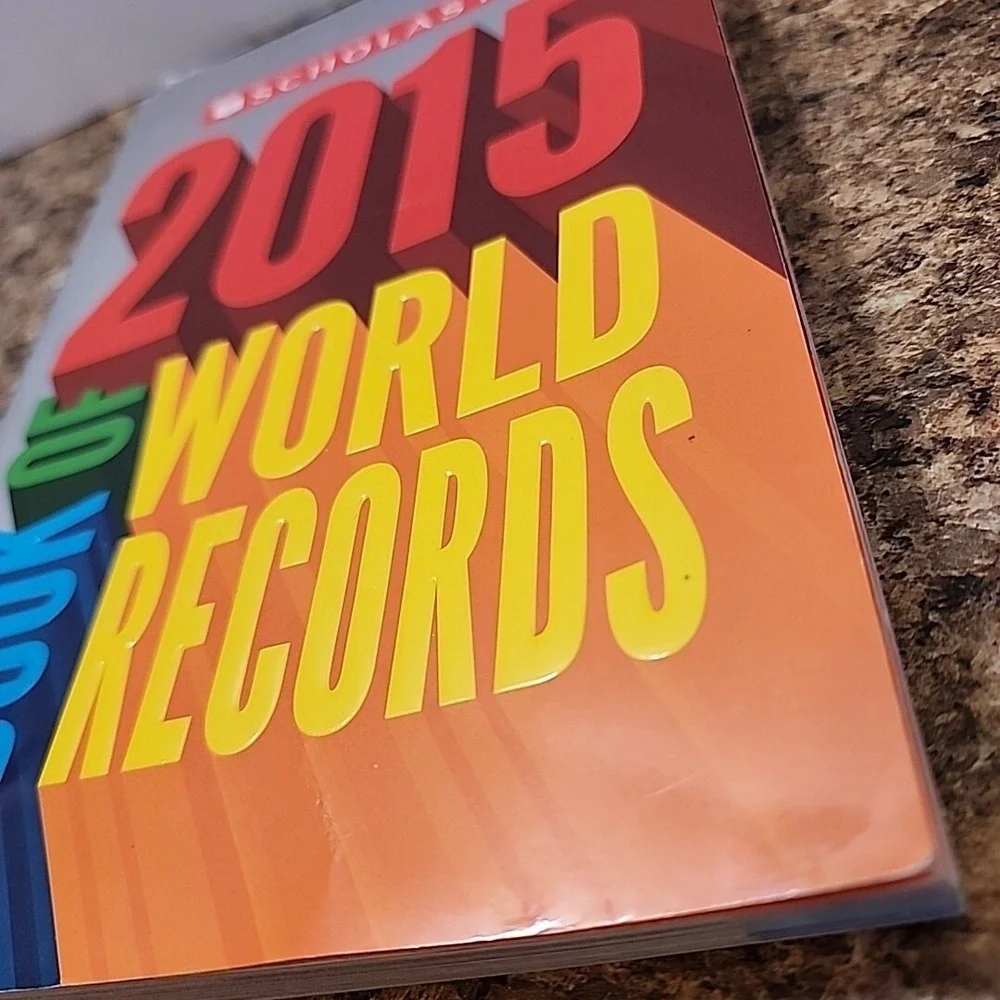 Scholastic 2015 Book of World Records by Jennifer Corr Morse Music Animals Movie